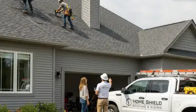 Vinyl siding installation by Knoxville, TN exterior contractors on a home renovation project