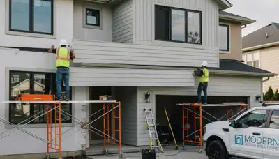 Professional vinyl siding installation on Knoxville TN home exterior by local siding contractors